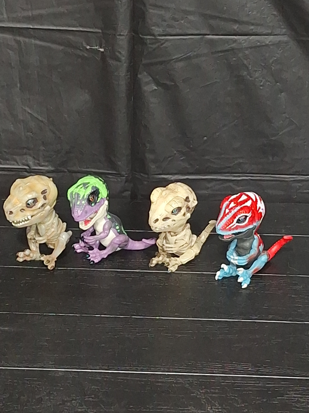 Fingerlings T-Rex Multi-Color Collectible Set Of 4(Green, Purple, Red, Tan)